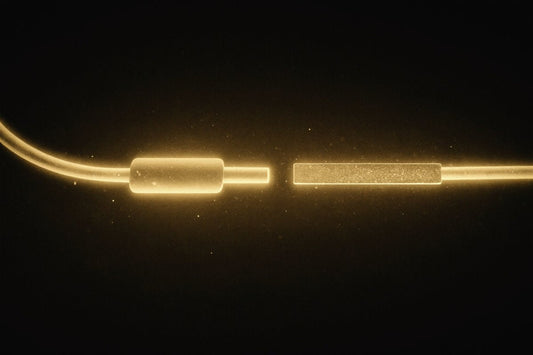 Two gold connectors meeting on black — USB-C vs Lightning