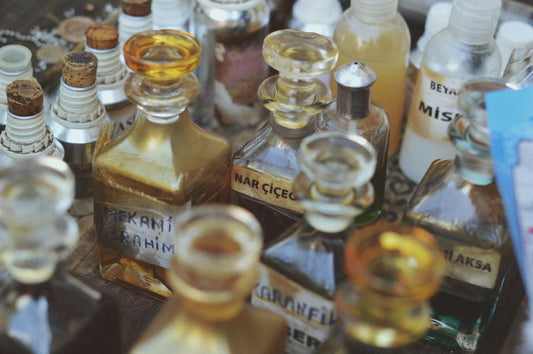 Collection of glass perfume bottles in close-up