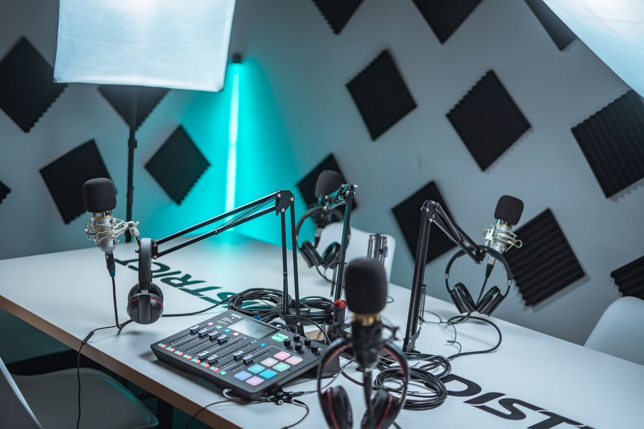 Podcast studio setup with microphones and audio mixer